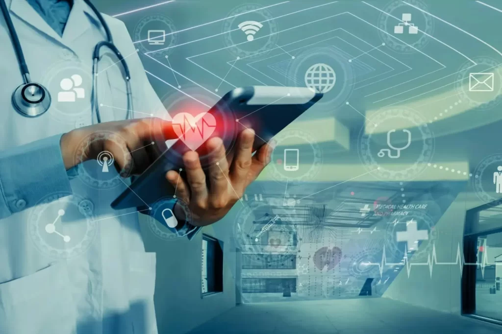 A doctor in a white coat uses a tablet with medical icons around it